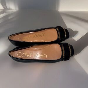 Calvin Klein Black Flats with Gold Accents